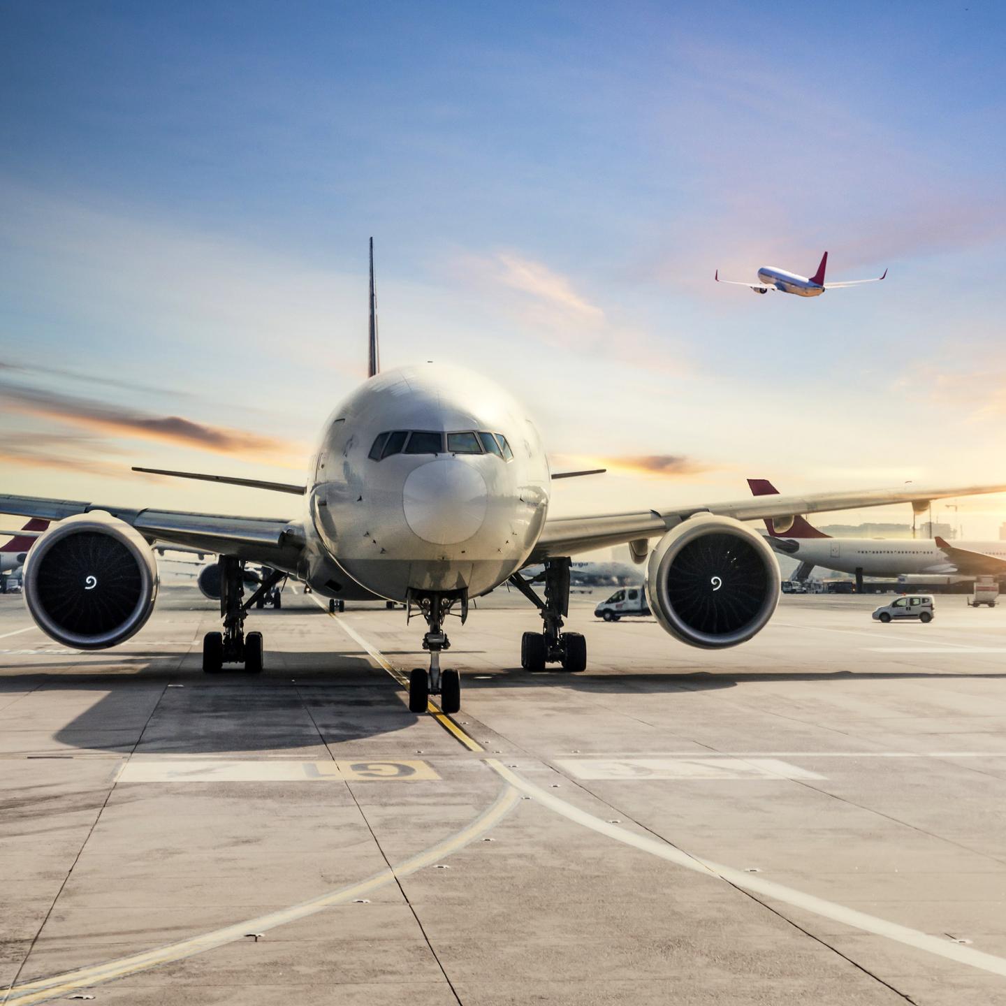 image of a plane in an airport