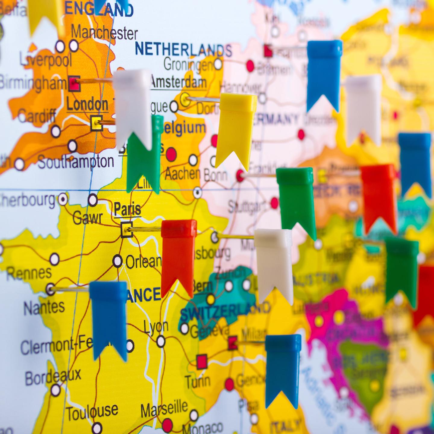 Map with flags pinned into locations